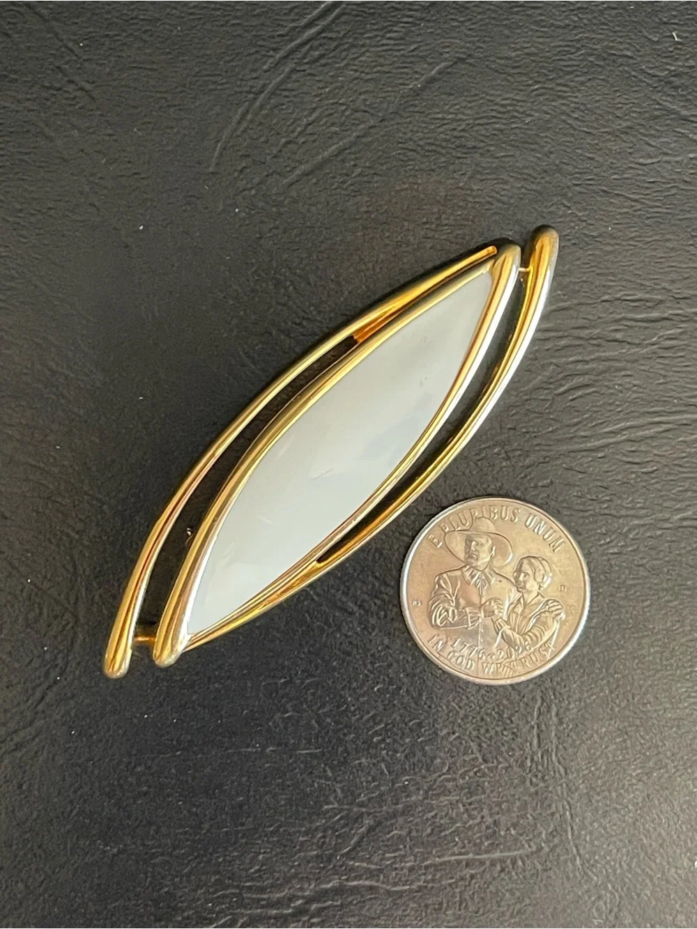 Vintage Monet Gold Tone & color enamel Marquise brooch.